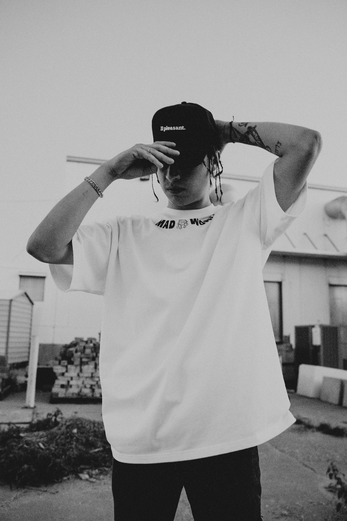 a young man with a hat on his head