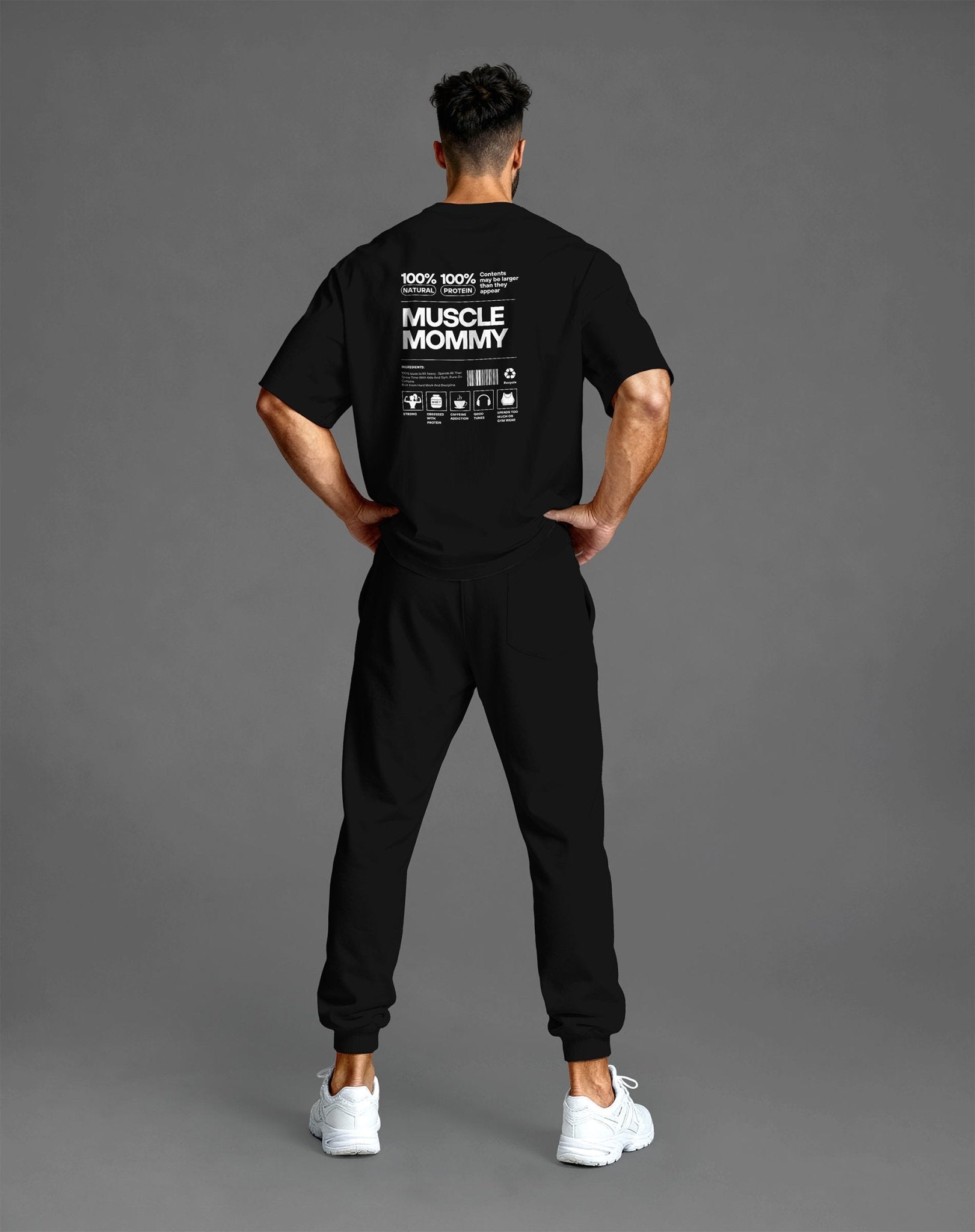 Schwarzes Oversized Unisex Gym Shirt mit „Muscle Mommy“ Print – Streetwear für Stärke & Disziplin